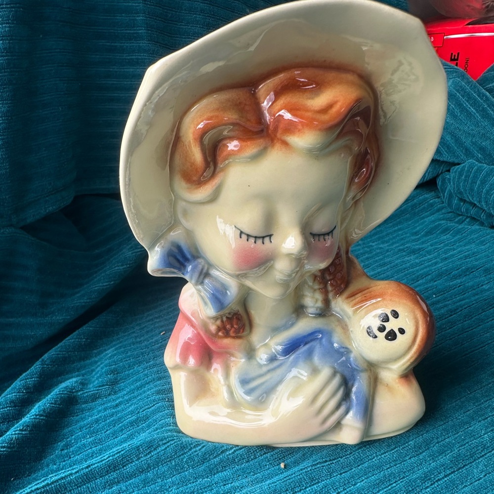 Charming Ceramic Figurine with Blue and Cream Accents
